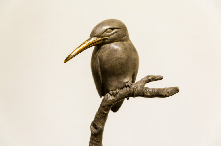 Brass bird statue