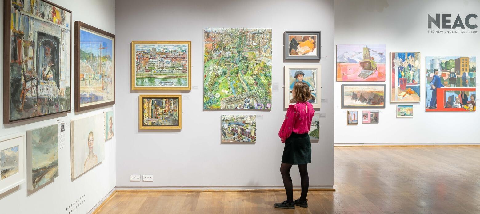 Photo of paintings in the West Gallery during NEAC 2024