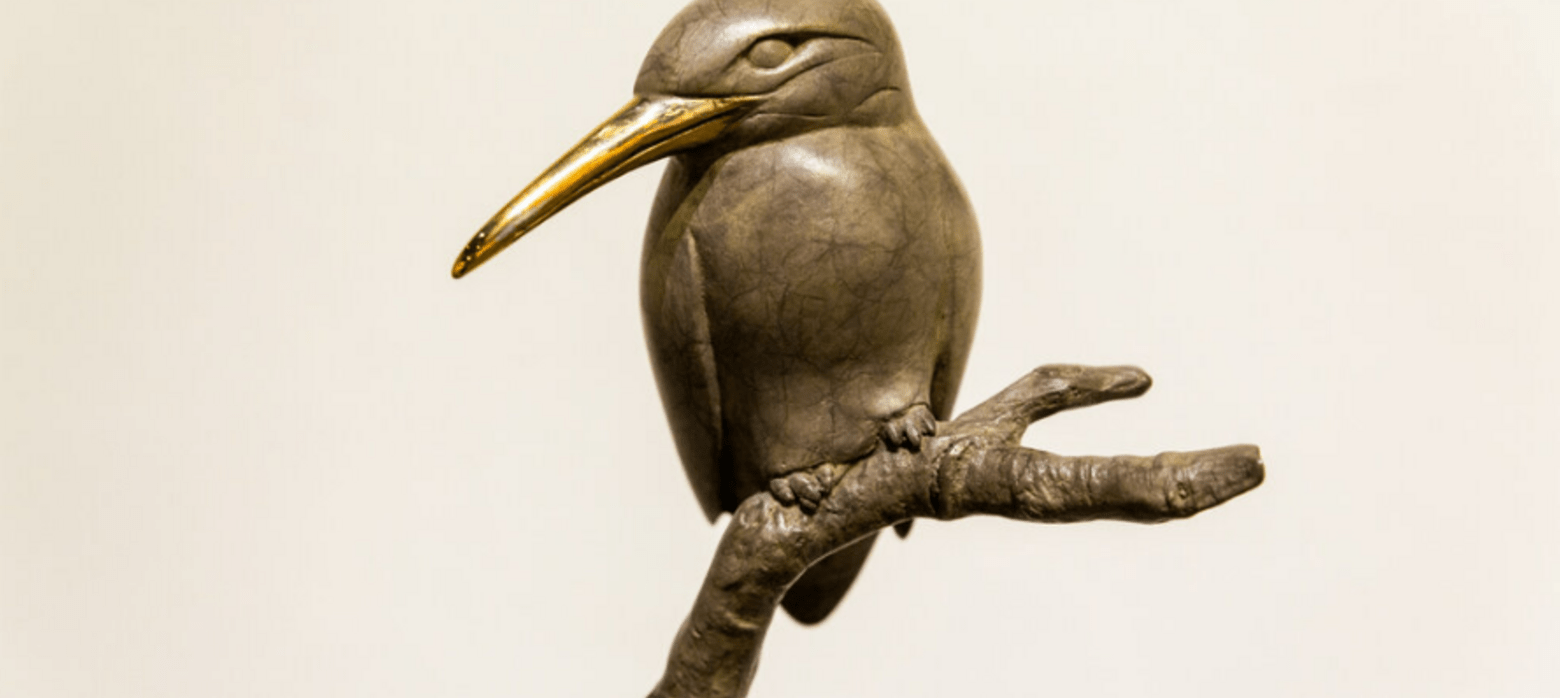 Brass bird statue