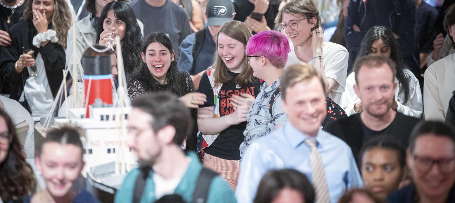 image of a crowd laughing