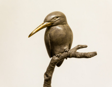 Brass bird statue