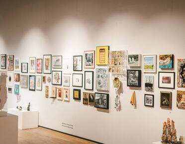 view of west gallery wall from previous discerning eye exhibition