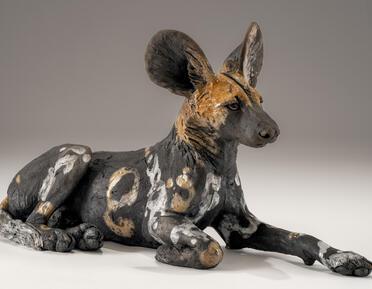 Ceramic sculpture of wild dog